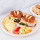 Karat Earth 10'' PFAS Free Compostable Bagasse Round Plates, Natural, 3 Compartments - 500 pcs